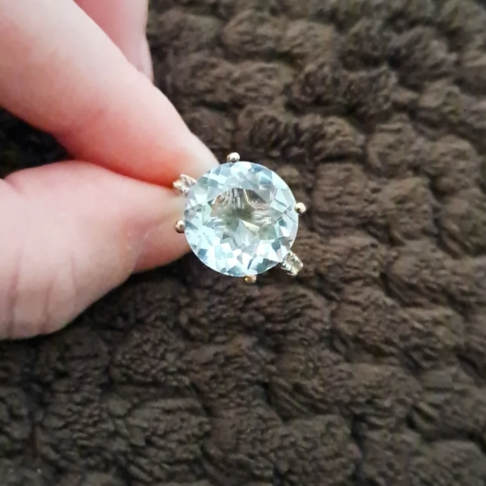 White Topaz Ring In 18k Yellow Gold Over 925 Sterling Silver.